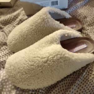 White wool mules, size 8.